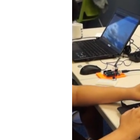 Stanley shows off his Arduino project to another curious camper at at the White Plains Library's Maker Camp this summer.