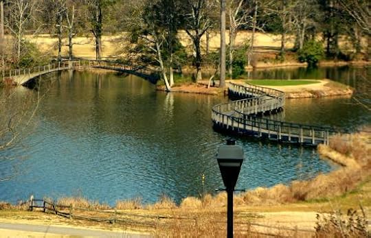 And pass the many glass still lakes with the arched and meandering bridges.
