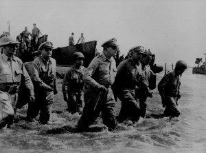 MacArthur wading ashore at Leyte, Philippine Islands, 20 October 1944 (US National Archives)