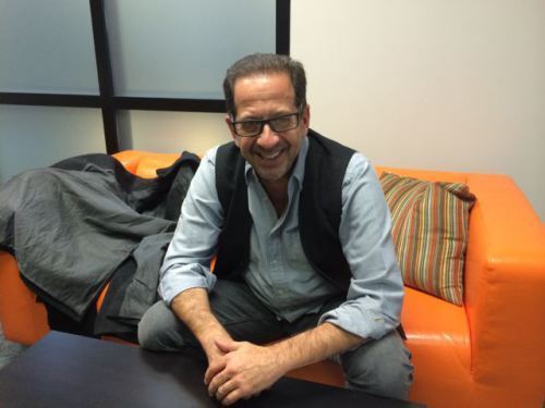Executive Producer Jay Firestone sits on my garish orange office couch in this undated photograph (Okay, it was this morning).