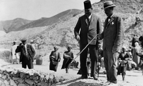 The British archaeologist Howard Carter at the tomb of Tutankhamun, in 1923.
