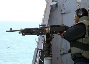 Gunner's Mate 1st Class Montrell Dorsey with M240B automatic weapon Image by US Navy, public domain