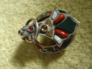 Cairngorm piece that may be worn as a pin, pendant - or scarf clip. I bought it in Edinburgh.