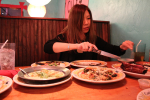 She's not joking when she says she eats unseemly portions in a single sitting. Where does it go?
