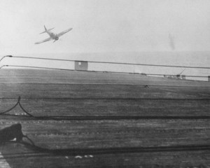 Japanese special attack (kamikaze) Zero fighter diving on USS White Plains, 25 October 1944