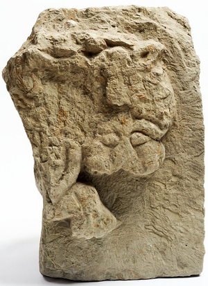 A bas relief showing a lion being clawed by a griffin was found in the remains of a Christian temple at the Ukek city site.