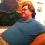 Bill Hamilton enjoys a moment, with snail.