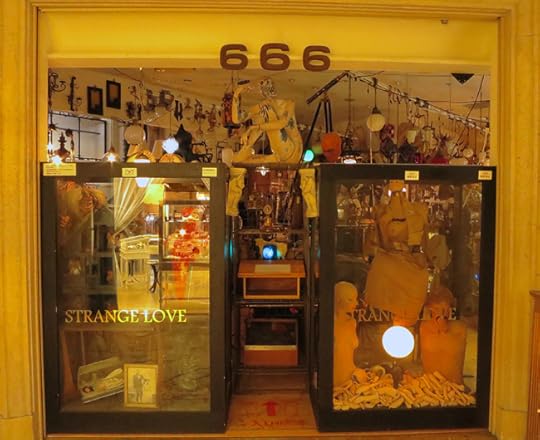 See the blue light? And the bell? Right under the store's creepy address?