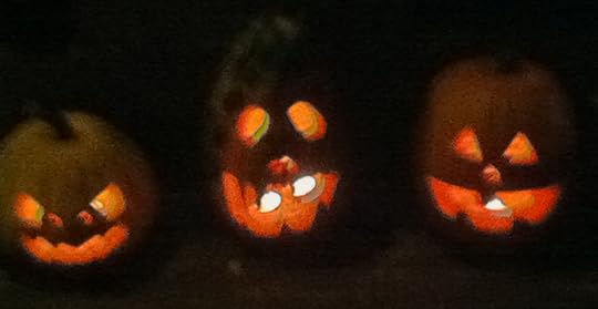 This trio of jack o' lanterns adorn my neighbors' door. The term jack-o'-lantern is in origin a term for the visual phenomenon ignis fatuus (lit., 