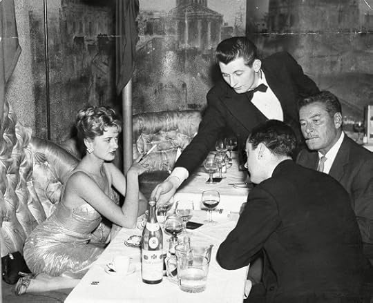 Errol Flynn Pictured With Beverley Aadland (beverley Adland) At The Lido Nightclub Swallow Street London. (lido Club). The Couple Starred In The Film Cuban Rebel Girls And Had A Highly Publicised Relationship For The Last Two Years Of Flynn's Life.
