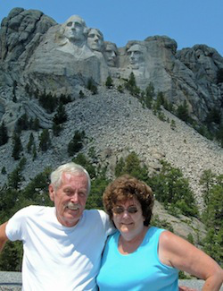 Norm and his wife Pamela vacationing at Mt. Rushmore.