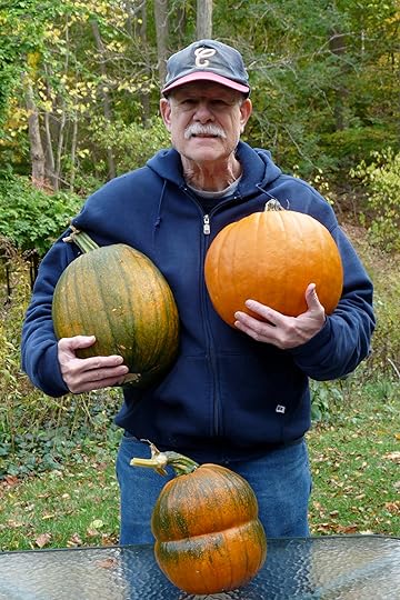 This year my husband, Al, planted pumpkins...Here he is with his harvest!