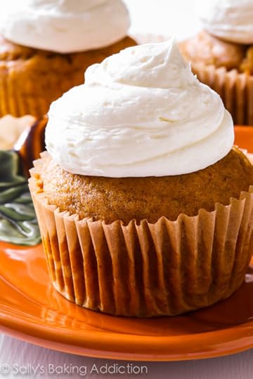 Spiced Pumpkin Cupcakes with Marshmallow Frosting-- these will be your new favorite pumpkin dessert! Recipe on sallysbakingaddiction.com