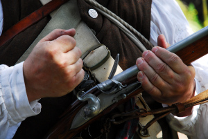 colonial militia preparing to fire