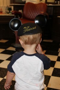 The finishing touch on your child's first haircut.