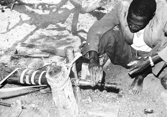 Carving a candlestick. Photo taken by Rex Beam