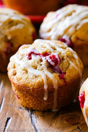 Cranberry Orange Muffins by sallysbakingaddiction.com-- buttery and moist, these festive muffins are packed with flavor!