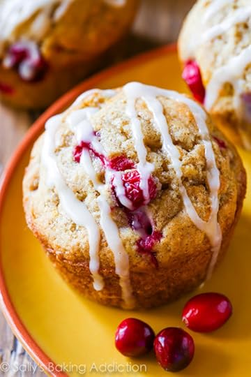 Cranberry Orange Muffins by sallysbakingaddiction.com-- buttery and moist, these festive muffins are packed with flavor!