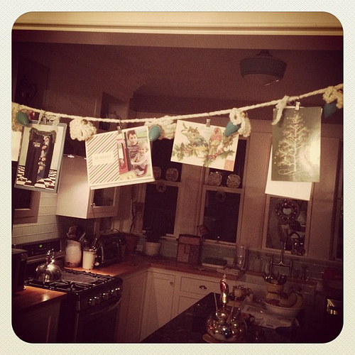 Holiday cards clipped to a scarf in our dining room. Love this time of yr.