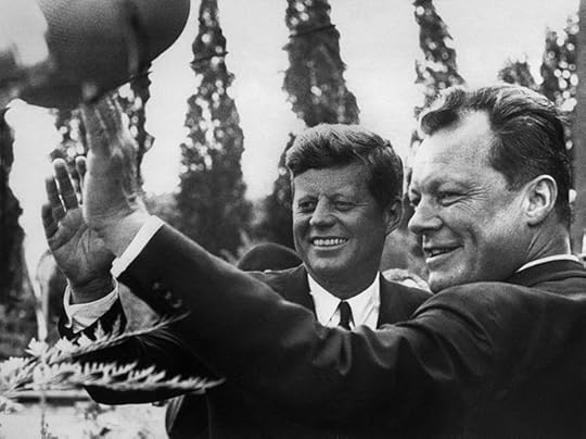 US President John F. Kennedy (left) and Mayor of West Berlin Willy Brandt wave to the crowd during the president's visit, on June 26, 1963. (AFP Photo)
