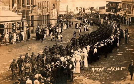 Men, women and children line the streets to watch the procession of the 41st Battalion through Brisbane on Anzac Day, 1916. State Library Queensland. Public domain via Wikimedia Commons.