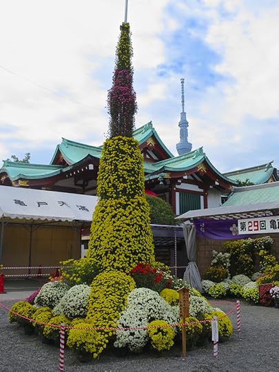 In addition to the bouffants, balls and prize specimens, the Kameido Shrine features this model of Skytree, with the t=real thing helpfully modeling for comparison in the background.