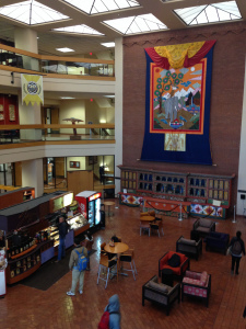 Campus library: A giant thangkha of the Four Friends hangs over a 100-foot altar in the lobby. At the espresso stand on the left, the barista told me the architecture is even starting to seep into other places around El Paso
