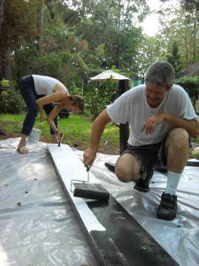 You can even make them yourself. That's my multi-talented publisher painting the joggling board in front of her office