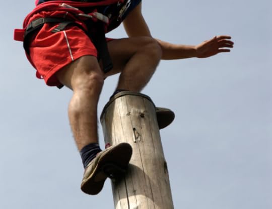 A Man Standing on Top of a Pole - Photo courtesy of ©iStockphoto.com/SLOFotomedia, Image #2939030
