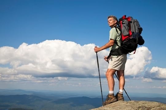 Backpacker on Mountain Summit - Photo courtesy of ©iStockphoto.com/cglade, Image #10473146