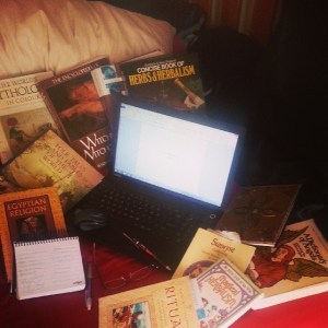My bed, laptop, note pade, glasses and a few of my beloeved books currently helping me in my research for 'There's no place like hell. I may be broke, but still love my Writing job. ;-)