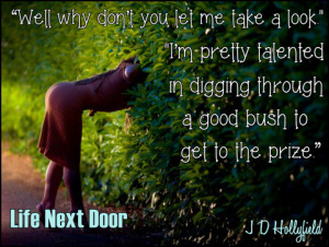 Woman looking into hedge at night