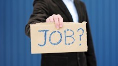 Person holding cardboard 