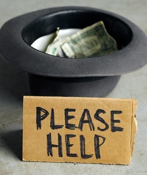 hat with money and sign