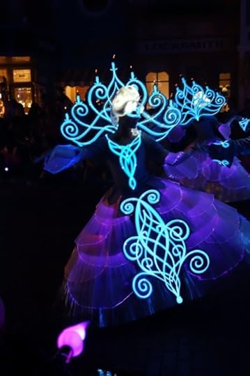 Note the paintbrush starting to change the color pattern on the dancer.