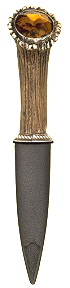 Stag-handled skean dubh with inset Cairngorm stone.
