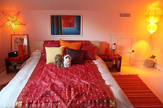 The blue colors in the painting (by Seth Damm) are a necessary accent among the warm colors in the room.