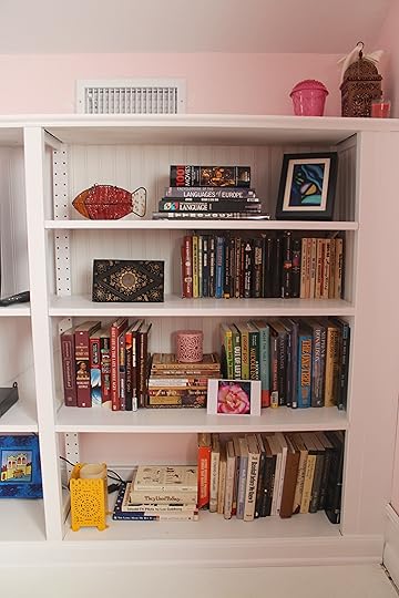One final look at the bookcase, transformed with paint, trim, and beadboard.