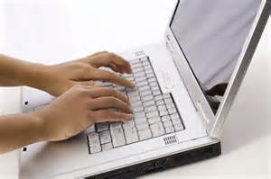 typing on laptop
