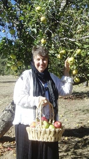 Picking apples from trees Elsie's father planted in 1904 .