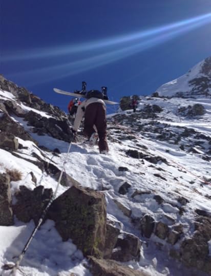 Sean Buxton makes like a mountain goat, if a goat could snowboard and hold a rope