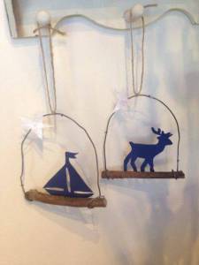 Week 1: Christmas ornaments made from recycled wood and wire from our farm