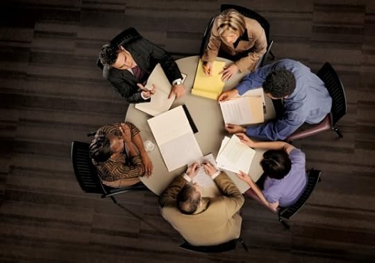 Group of People in a Serious Meeting from Above - Photo courtesy of ©iStockphoto.com/francisblack, Image #7198789