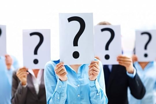 Business colleagues holding question mark signs in front of their faces - Photo courtesy of ©iStockphoto.com/Yuri_Arcurs, Image #11860969