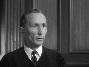 Ken Drake in The Outer Limits episode, I, Robot as the judge.