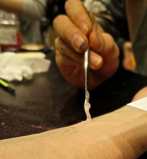 First, trowel on the 3-D goop that makes the ultra-realistic edges of the wound. This stuff dried into a silicone-like consistency.