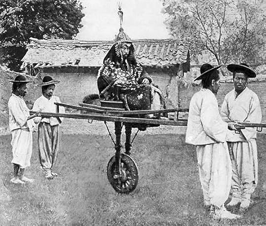 A nobleman is carried on a litter by four bearers, Korea, circa 1900