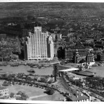Maiden flight of CNAC's first Douglas Dolphin over Garden Bridge and Broadway Mansions, October 1934