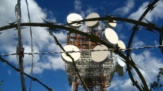 Communications arrays behind closing-off barbed wire