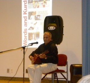 Shahram playing the tanbour.